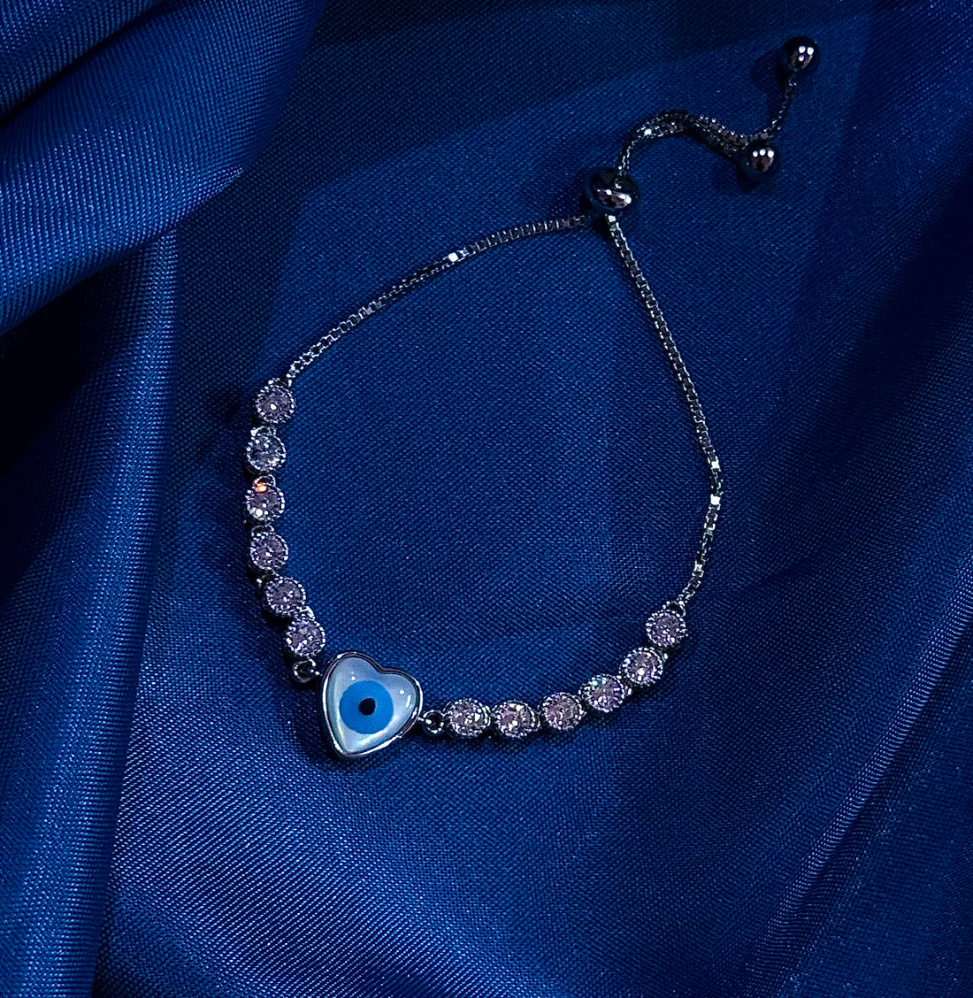 Silver cuban, heart evil eye bracelet