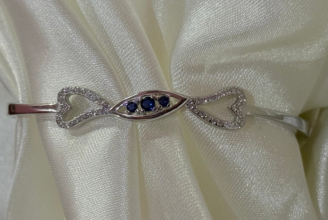 Silver two heart with blue stone kada