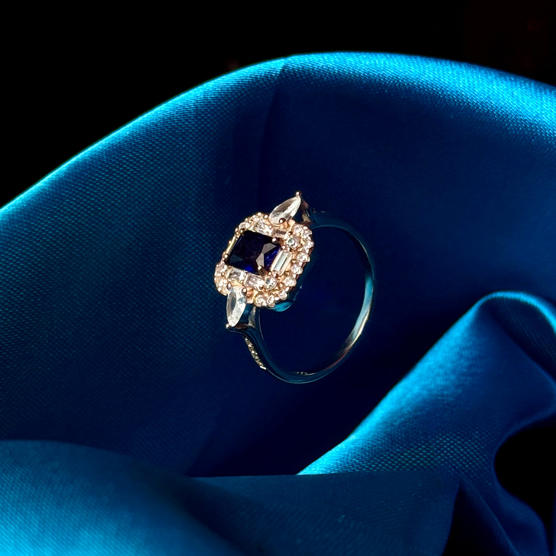 rose gold plated silver blue stone ring