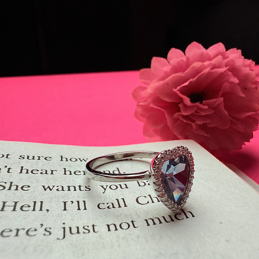 Blue heart stone with american diamonds ring