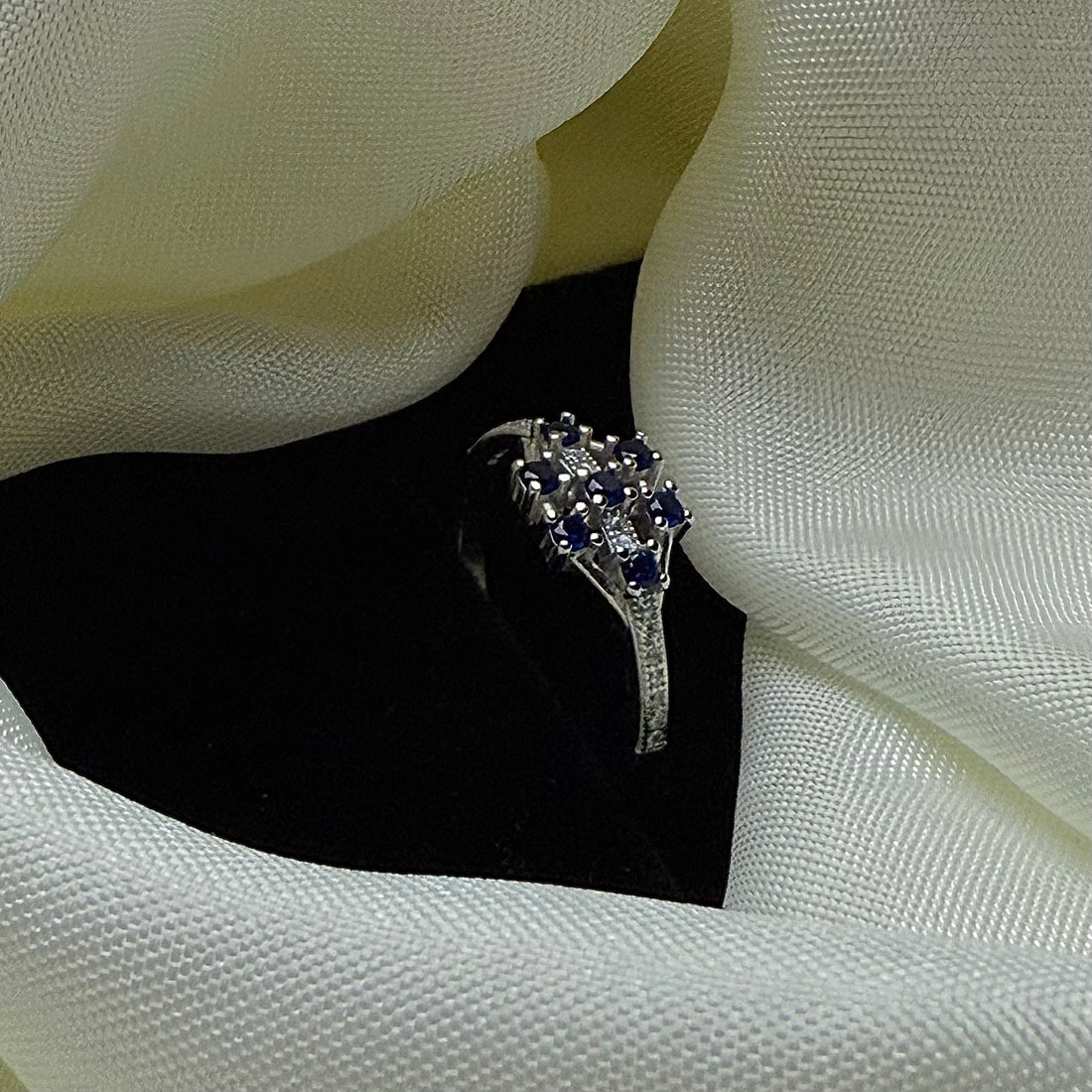 Silver seven blue american diamond ring