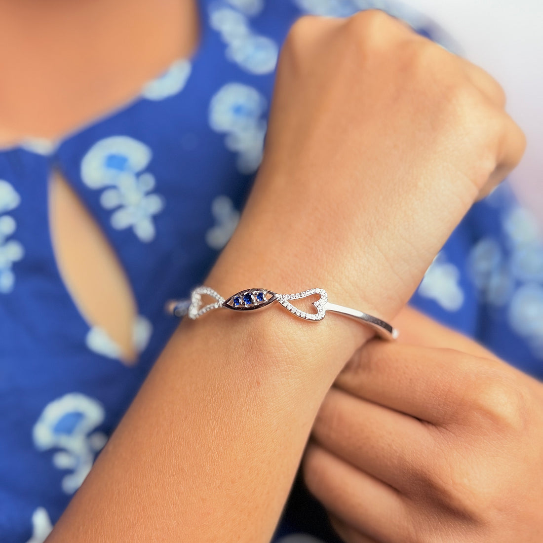 Silver two heart with blue stone kada