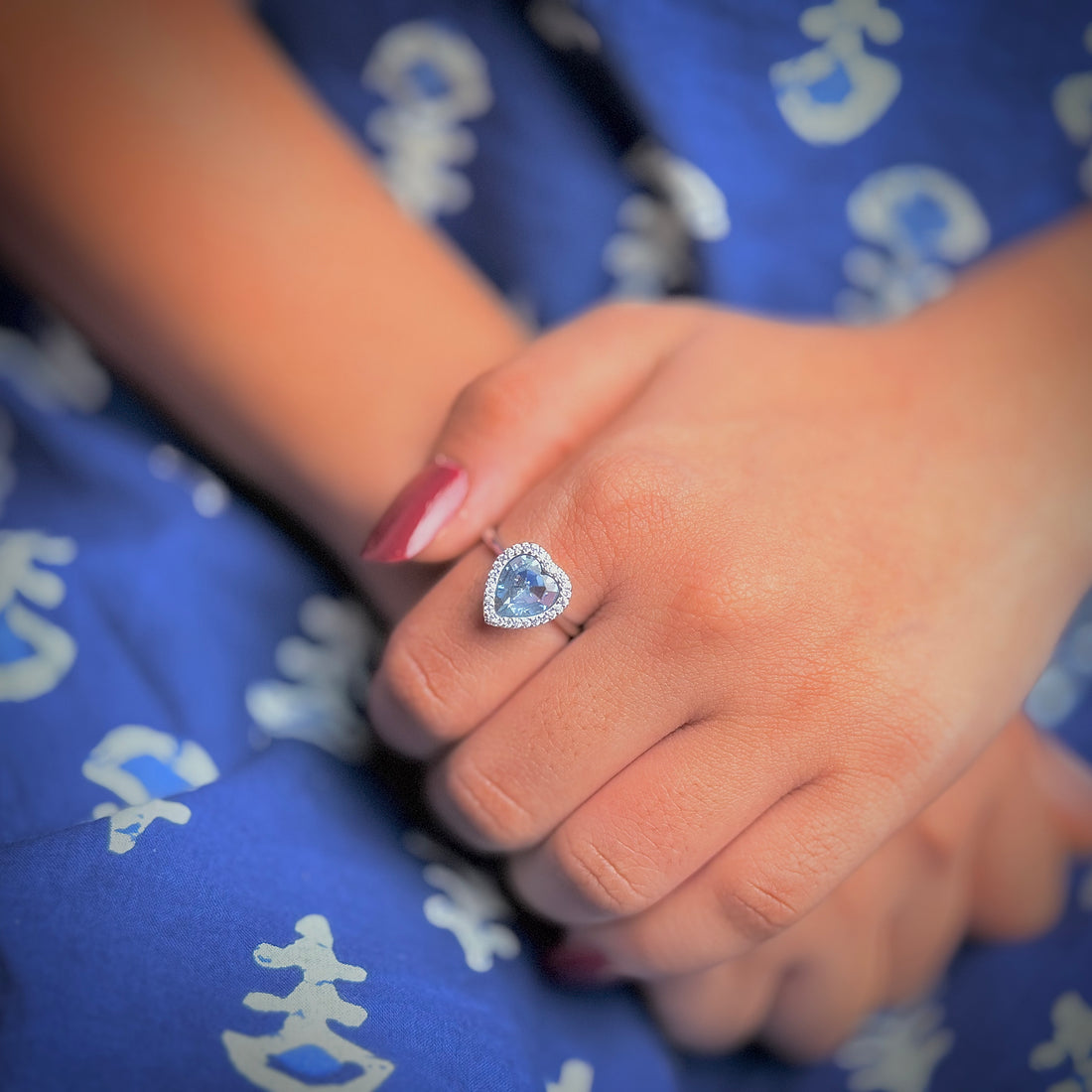 Blue heart stone with american diamonds ring